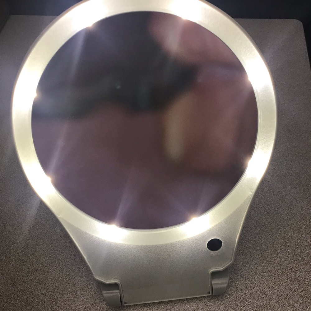 Sharper Image 10x lighted folding travel mirror